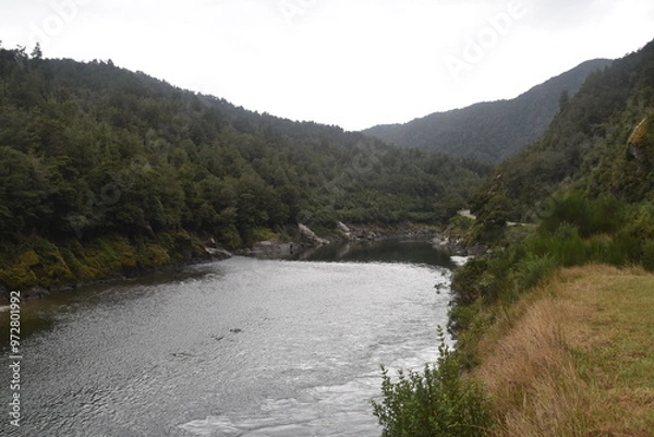 Fototapeta Hiking along the Punakaiki River Track and coastline in the Paparoa National Park, New Zealand