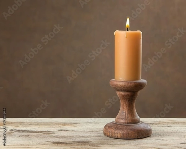 Obraz A rustic candleholder with melted wax remnants, sitting on a timeworn table covered in dust antique candleholder, timeworn, rustic