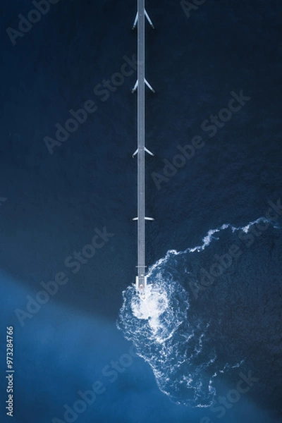Fototapeta Aerial view of blue ocean and a sewage treatment plant on the sea