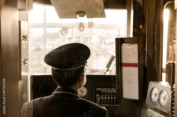 Obraz Asian train driver in the train cabin