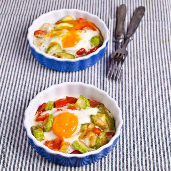 Fototapeta Fried eggs with vegetables