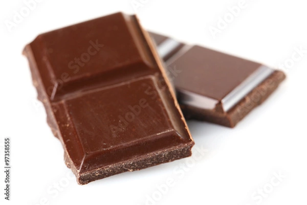 Fototapeta Black chocolate pieces isolated on white background