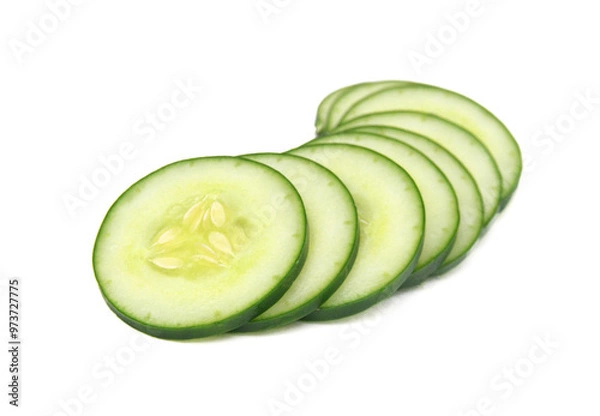 Fototapeta Cucumber and slices isolated over white background.