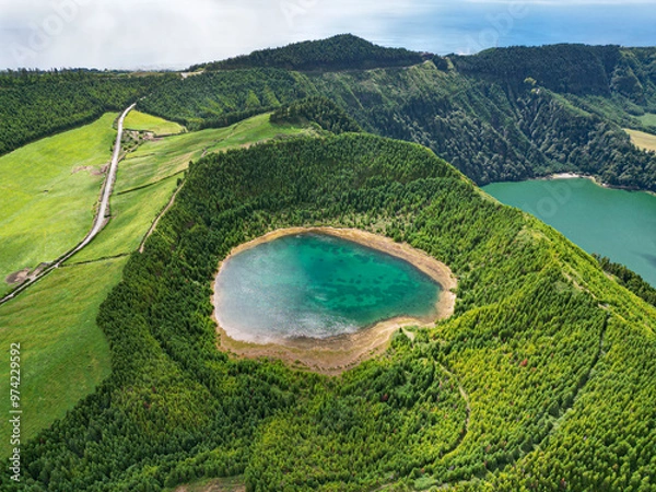 Fototapeta Picturesque aerial drone view of Lagoa Rasa and Lagoa Verde volcanic crater lakes. Turquoise water, forest and breathtaking green landscape. Sete Cidades, Sao Miguel, Azores, Portugal