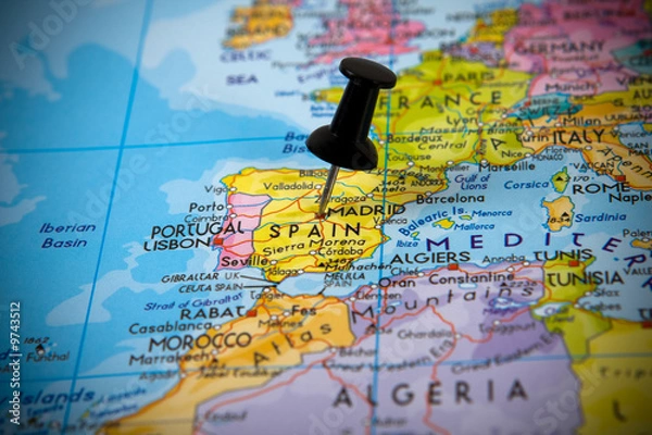 Fototapeta Small pin pointing on Madrid (Spain) in a map of Europe