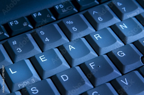 Obraz clos up view of keys on keyboard spelling the word learn