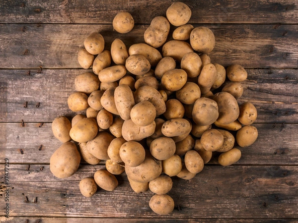 Obraz Potato Heap On Old Boards
