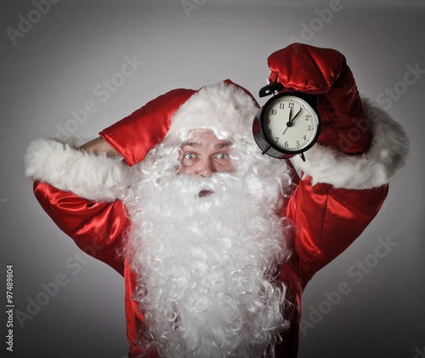 Obraz Santa Claus and a clock