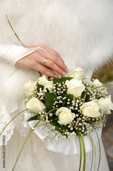 Obraz Bride's hands holding wedding bouquet
