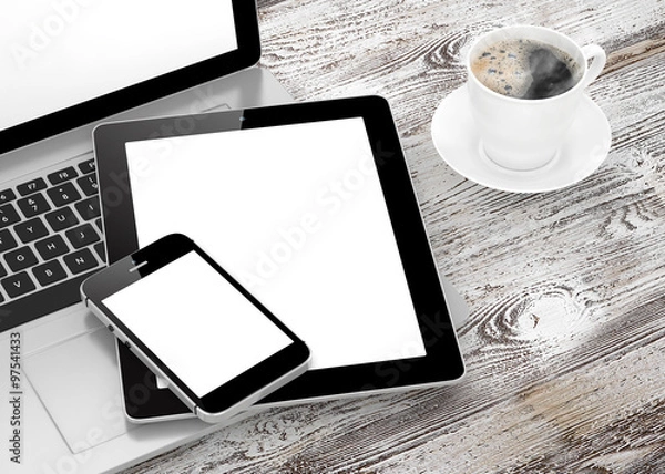 Fototapeta Laptop, phone, tablet pc and coffee.