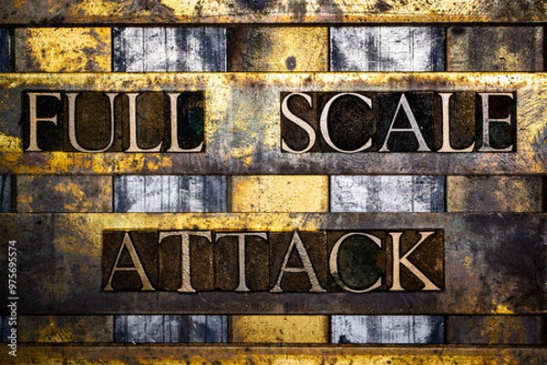 Fototapeta Full Scale Attack text in real authentic typeset letters on vintage textured silver grunge copper and gold background