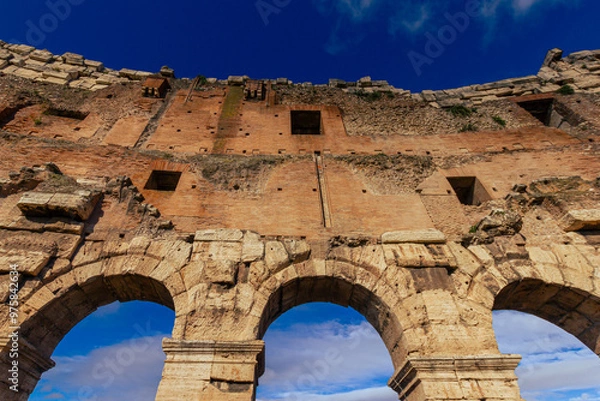 Fototapeta Close up of some of the arches of the The Colosseum
