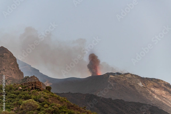 Fototapeta smoke from the erupting volcano on the island of Stromboli