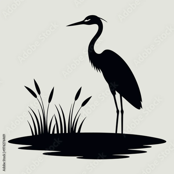 Fototapeta a heron standing on the edge of a body of water. The heron is facing towards the right side of the image, with its long neck and legs extended