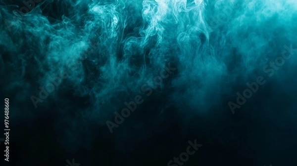 Fototapeta Abstract Blue Smoke Swirls Against Black Background
