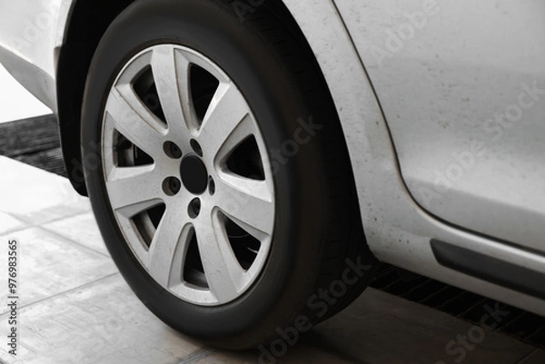 Fototapeta Modern auto with dirty stains, closeup view