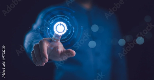 Fototapeta Businessman pressing power button concept. Digital technology touch screen. Hardware equipment concept. Start or shut down concept.