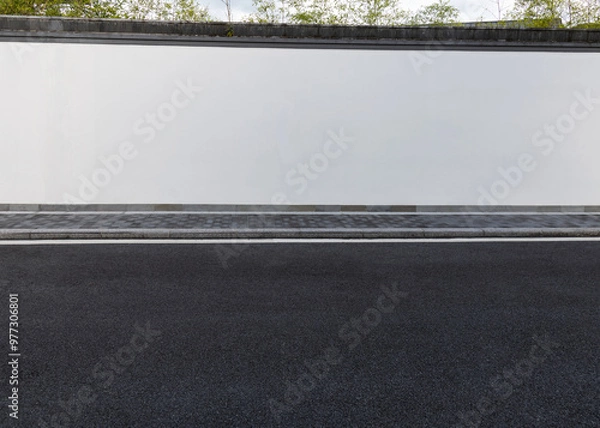 Fototapeta Empty concrete wall at the roadside