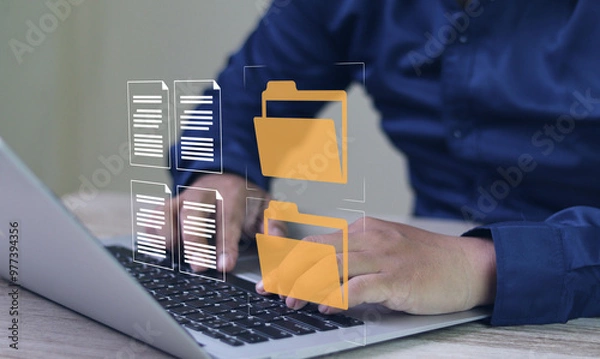 Fototapeta Business data management online and document system concept, Businessman use laptop search for digital documents in folders efficient storage management good planning