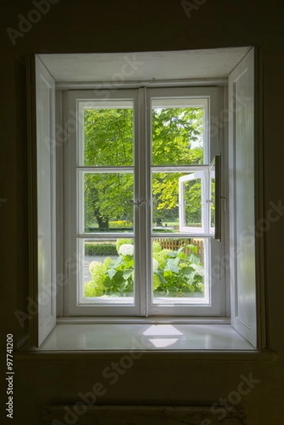 Fototapeta Window with view on garden