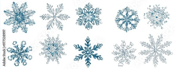 Fototapeta Christmas snowflakes in delicate patterns, isolated on white background.