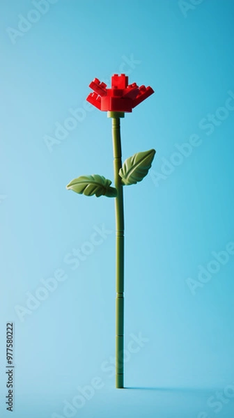 Obraz Tall red brick flower against a soft blue background