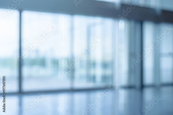 Obraz Abstract blurred image office window with soft light for background usage. Blur office window workplace interior background design concept.