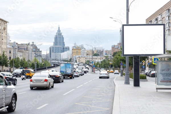 Obraz Blank horizontal large billboard in the city. Lots of cars on the road. Mock-up.