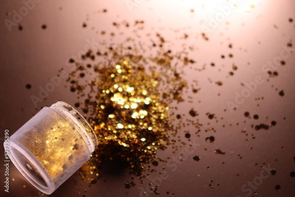 Obraz golden shiny glitter on a light brown background