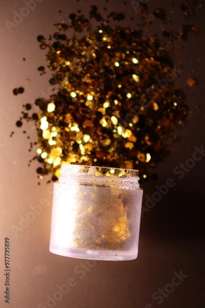 Obraz golden shiny glitter on a light brown background