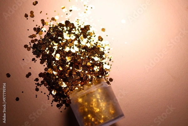 Obraz golden shiny glitter on a light brown background