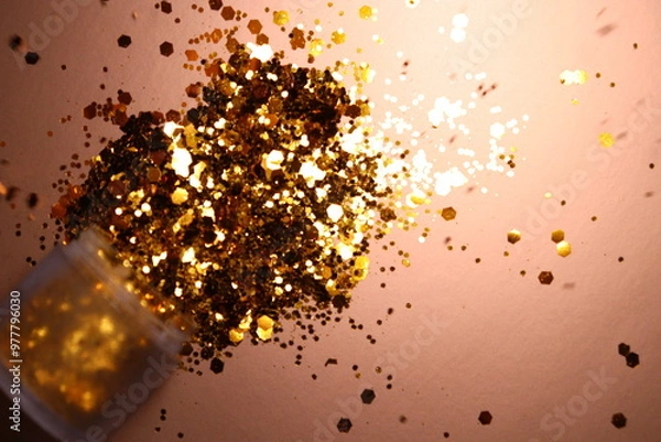 Obraz golden shiny glitter on a light brown background