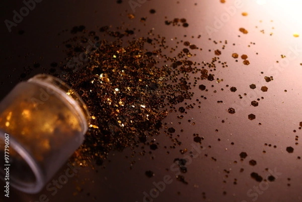 Obraz golden shiny glitter on a light brown background