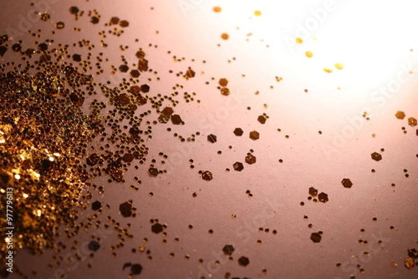 Obraz golden shiny glitter on a light brown background