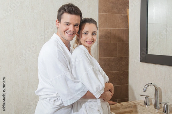 Fototapeta Man and woman hugging in bathroom