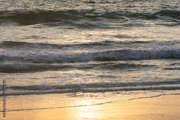 Fototapeta ocean with orange sky during sunset, for background purpose