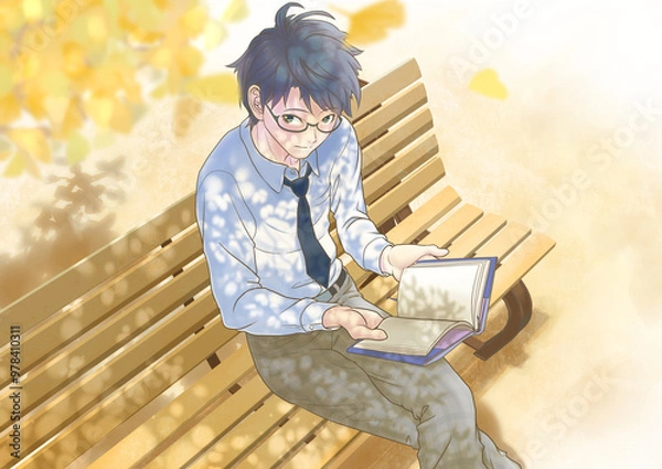 Obraz 木漏れ日の下でベンチに座って読書をする男子学生_銀杏と文字なし