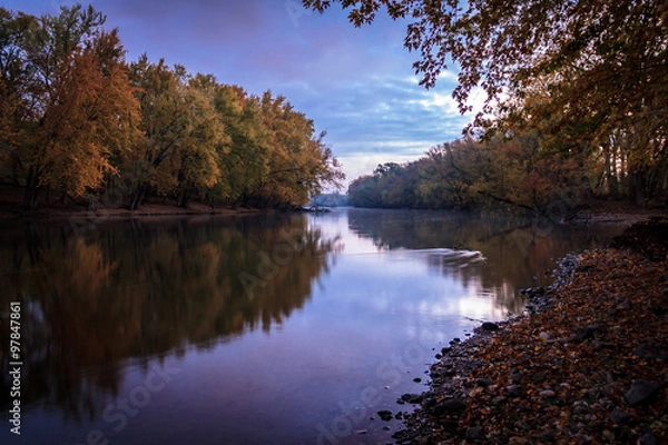 Fototapeta Peaceful and Serene River with Sky Reflections. Natural Beauty Background with Gorgeous Copy Space.