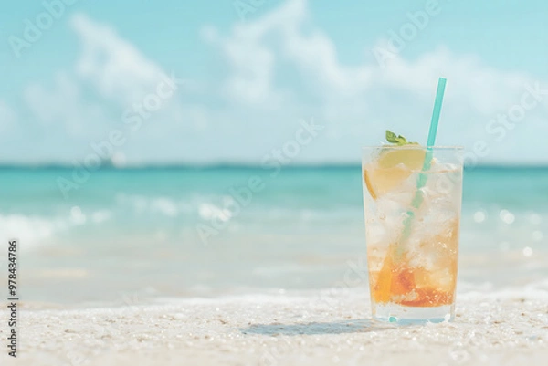 Fototapeta Refreshing Summer Drink on Sandy Beach with Ocean View