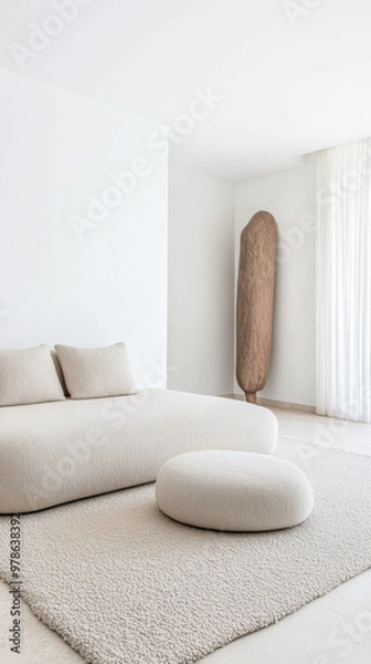 Fototapeta Minimalist living room with soft textures and neutral colors in a bright, modern home setting