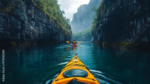 Fototapeta Group of kayakers paddle through stunning fjord surrounded by towering cliffs and lush greenery, ideal for promoting eco-friendly group adventures and showcasing Norway's natural wonders