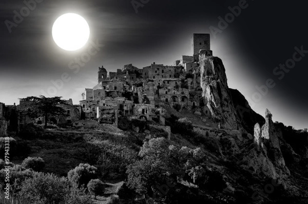 Fototapeta Moonlight at the abandoned village of Craco in Basilicata