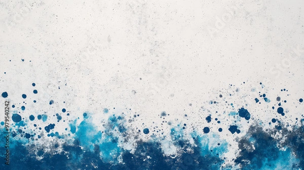 Fototapeta A blue and white background with splatters of paint
