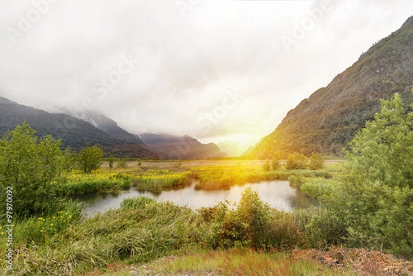 Fototapeta Thunder cloud over mountain tops 