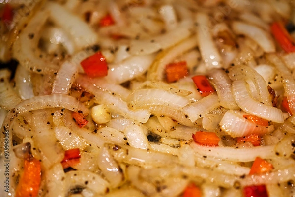 Obraz Sautéed onion and red bell pepper.