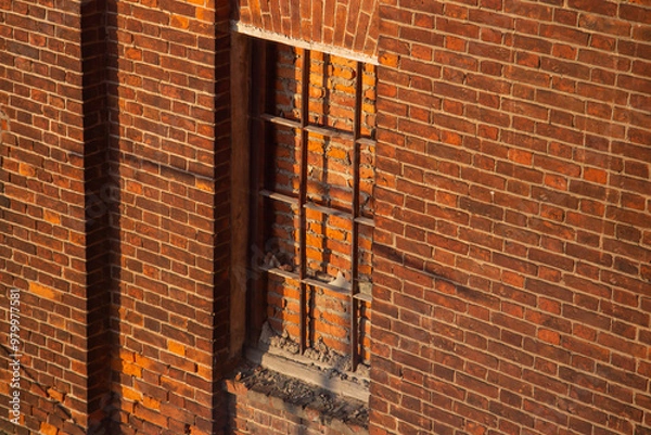 Obraz An old brick wall with a closed window
