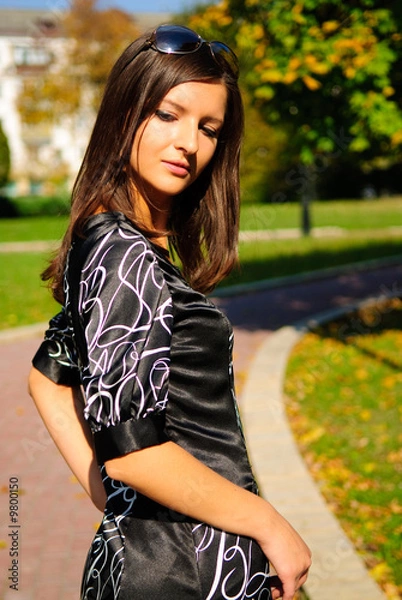 Obraz Pretty young girl in a autumn park