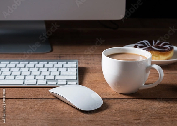 Obraz Coffee cup with donut and computer