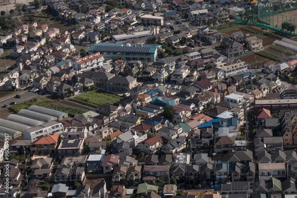 Fototapeta TOKYO - SEPT. 2017: Aerial view of population density in Tokyo prefecture Sept. 2017.