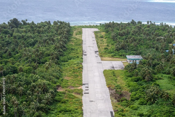 Obraz MICRONESIA - DEC. 2017: Aerial view of an airport in Micronesia, Dec. 2022.